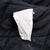 Interior care label on Carhartt J140BLK jacket showing size Large