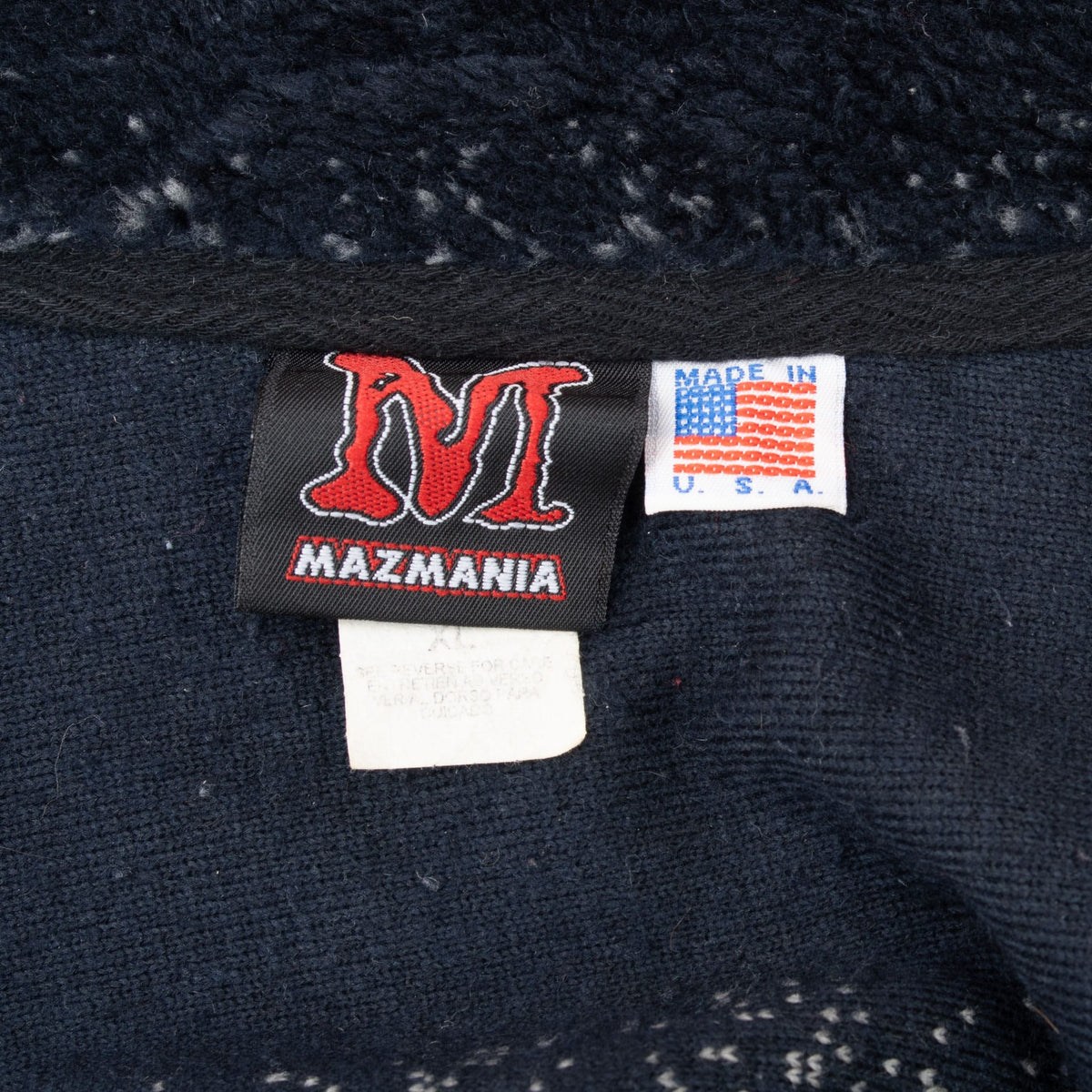 Mazmania neck label and Made in USA tag inside fleece jacket