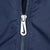 Close-up of silver Nike Swoosh cutout zipper pull on navy windbreaker