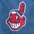 Close-up of embroidered Cleveland Indians logo on navy fabric