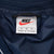 VINTAGE NIKE CENTER SWOOSH NAVY BLUE PULLOVER WINDBREAKER JACKET 1990S MEDIUM