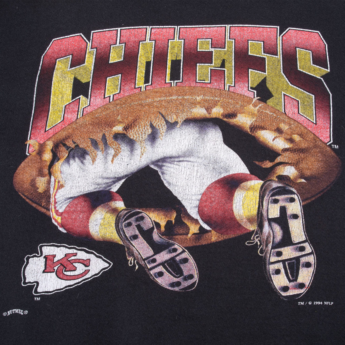 Close-up of back Chiefs football player graphic with Kansas City arrowhead logo
