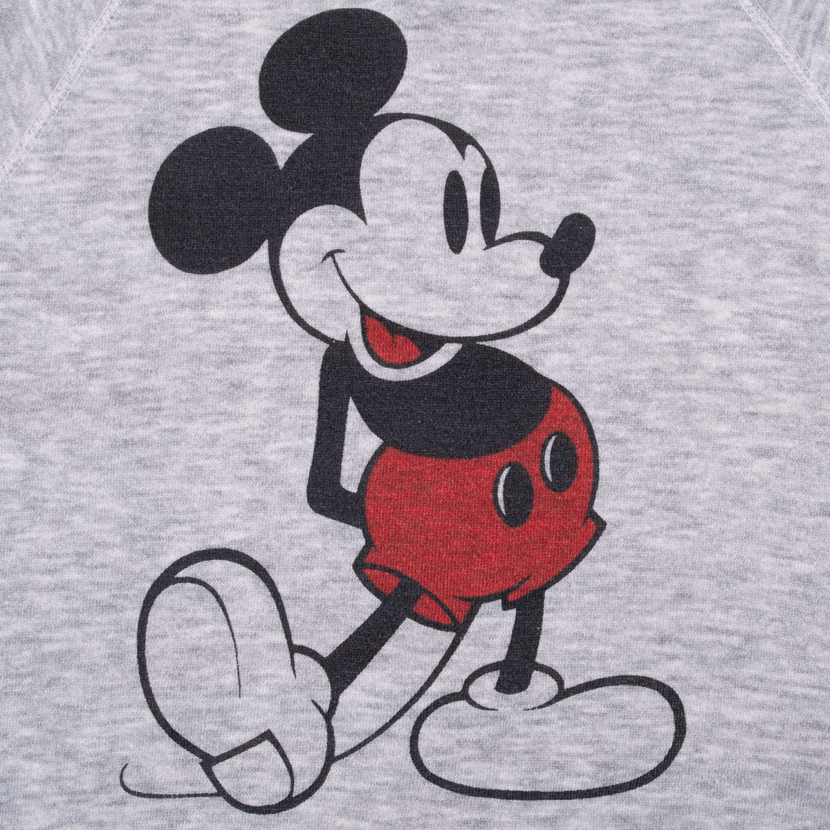 Close-up of seated Mickey Mouse graphic in black, red and white