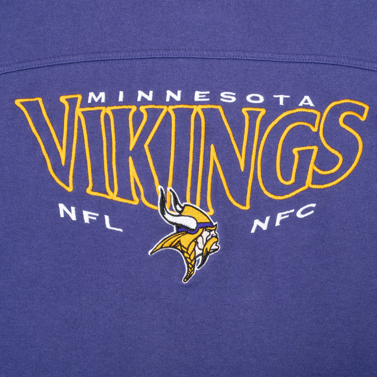 Close-up of embroidered Minnesota Vikings, NFL, NFC, and team logo chest design