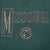 Close-up of the outlined Missouri block M and university seal front graphic