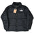 Full front of black The North Face Nuptse down jacket with oversized baffles and hangtag