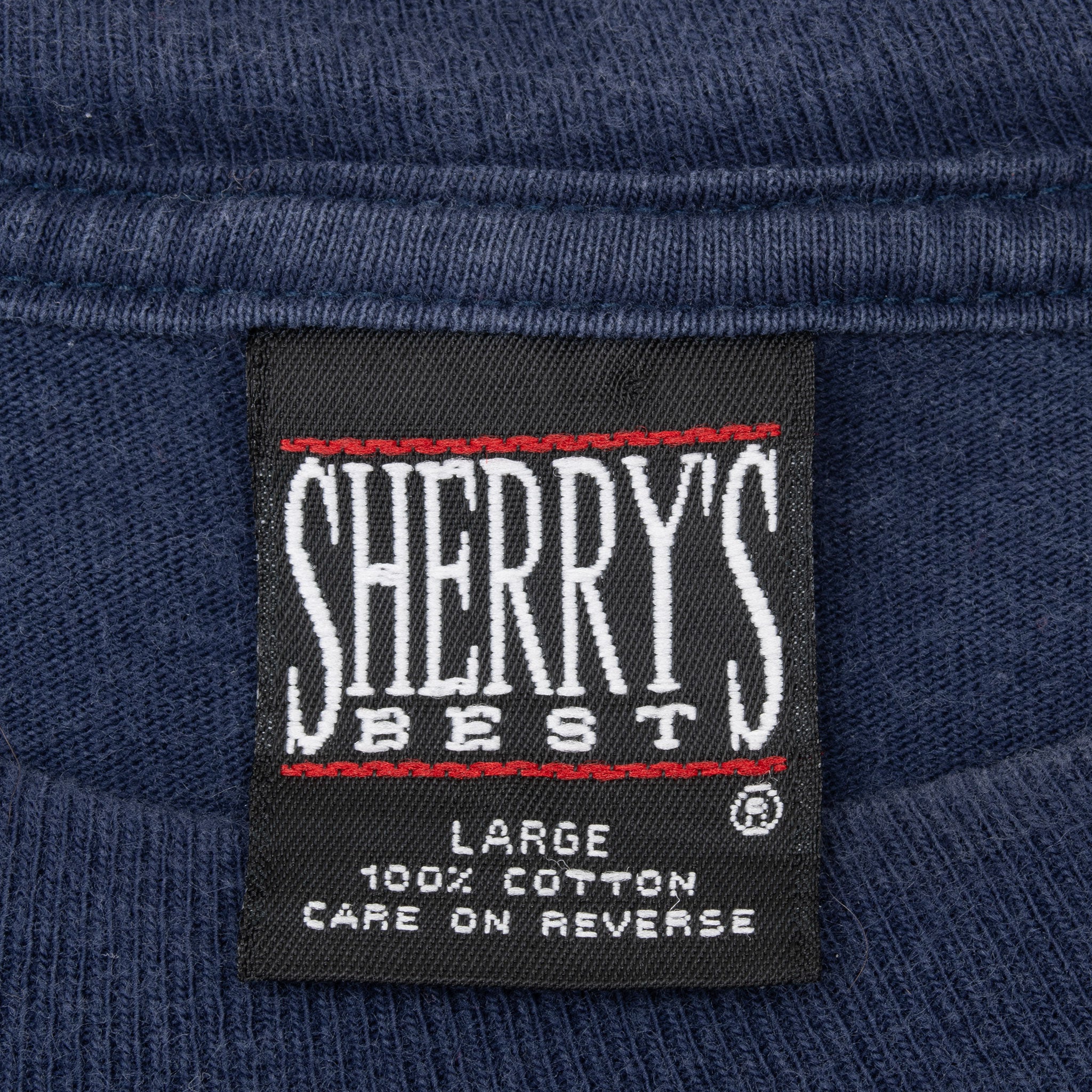 Sherry's Best large 100% cotton neck tag on navy Looney Tunes tee