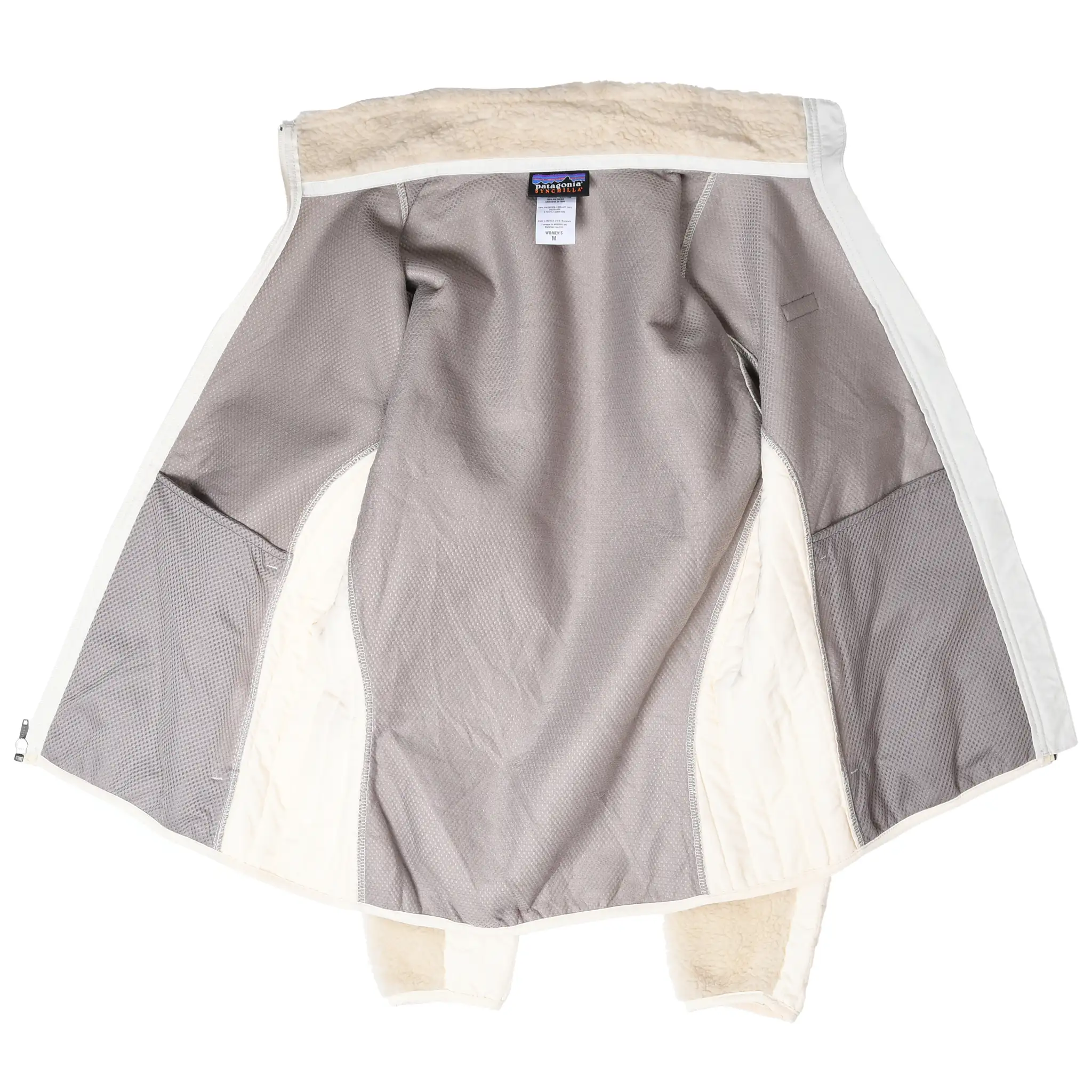 Open Patagonia Retro-X jacket showing gray mesh interior lining and inner seams