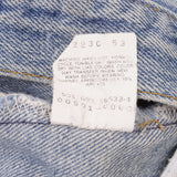 Beautiful Indigo Levis 501 jeans Made in USA with Light Wash.  Size on tag 35X23 Actual Size 33X28 Back Button #501