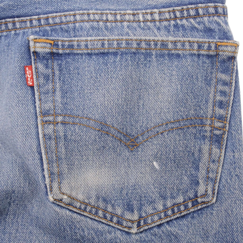 Beautiful Indigo Levis 501 jeans Made in USA with Light Wash.  Size on tag 35X23 Actual Size 33X28 Back Button #501
