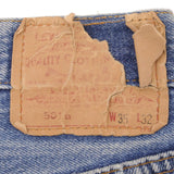 Beautiful Indigo Levis 501 jeans Made in USA with Light Wash.  Size on tag 35X23 Actual Size 33X28 Back Button #501