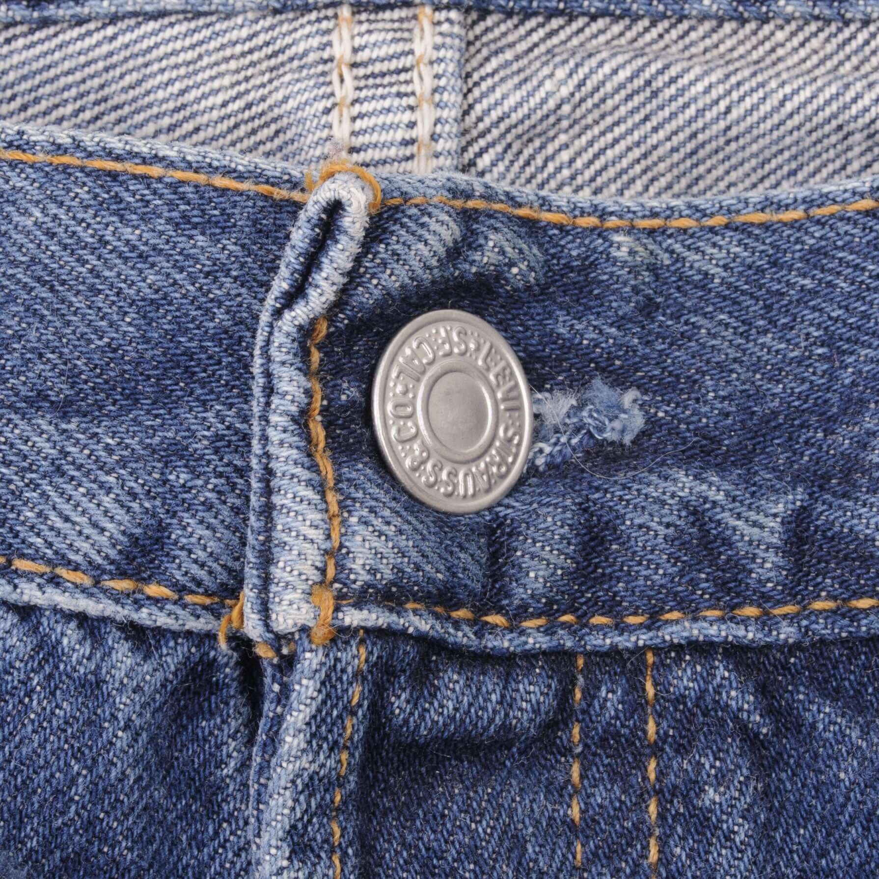 Beautiful Indigo Levis 501 jeans 1990s Made in USA with Medium Dark Wash.  Size on tag 36X32 Actual Size 35X31 Back Button #511