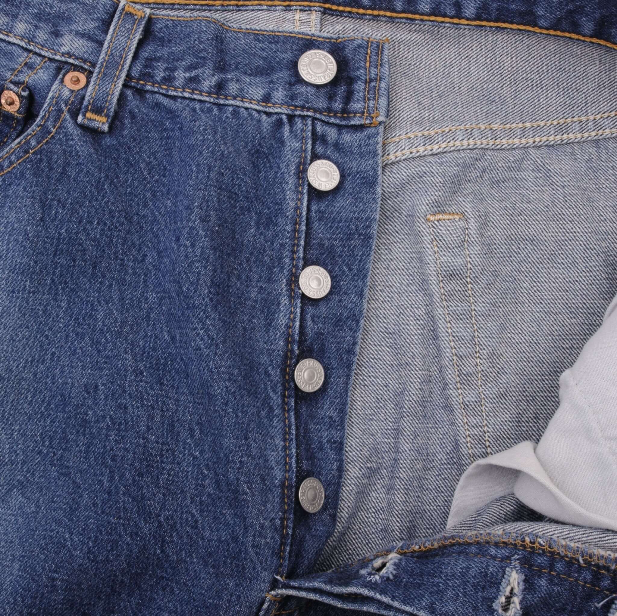 Beautiful Indigo Levis 501 jeans 1990s Made in USA with Medium Dark Wash.  Size on tag 36X32 Actual Size 35X31 Back Button #511