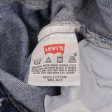 Beautiful Indigo Levis 501 jeans 1990s Made in USA with Medium Dark Wash.  Size on tag 36X32 Actual Size 35X31 Back Button #511