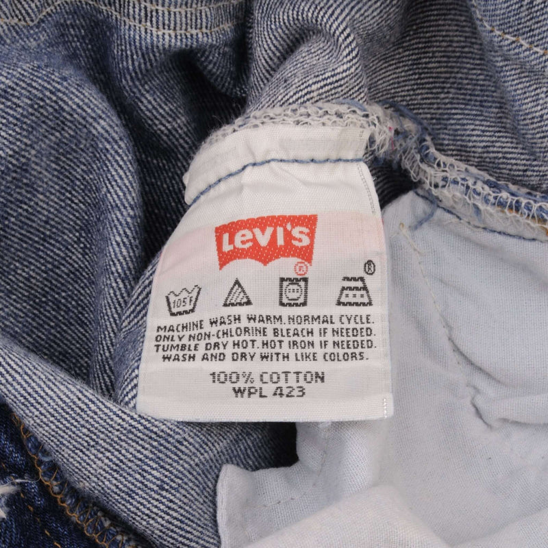 Beautiful Indigo Levis 501 jeans 1990s Made in USA with Medium Dark Wash.  Size on tag 36X32 Actual Size 35X31 Back Button #511