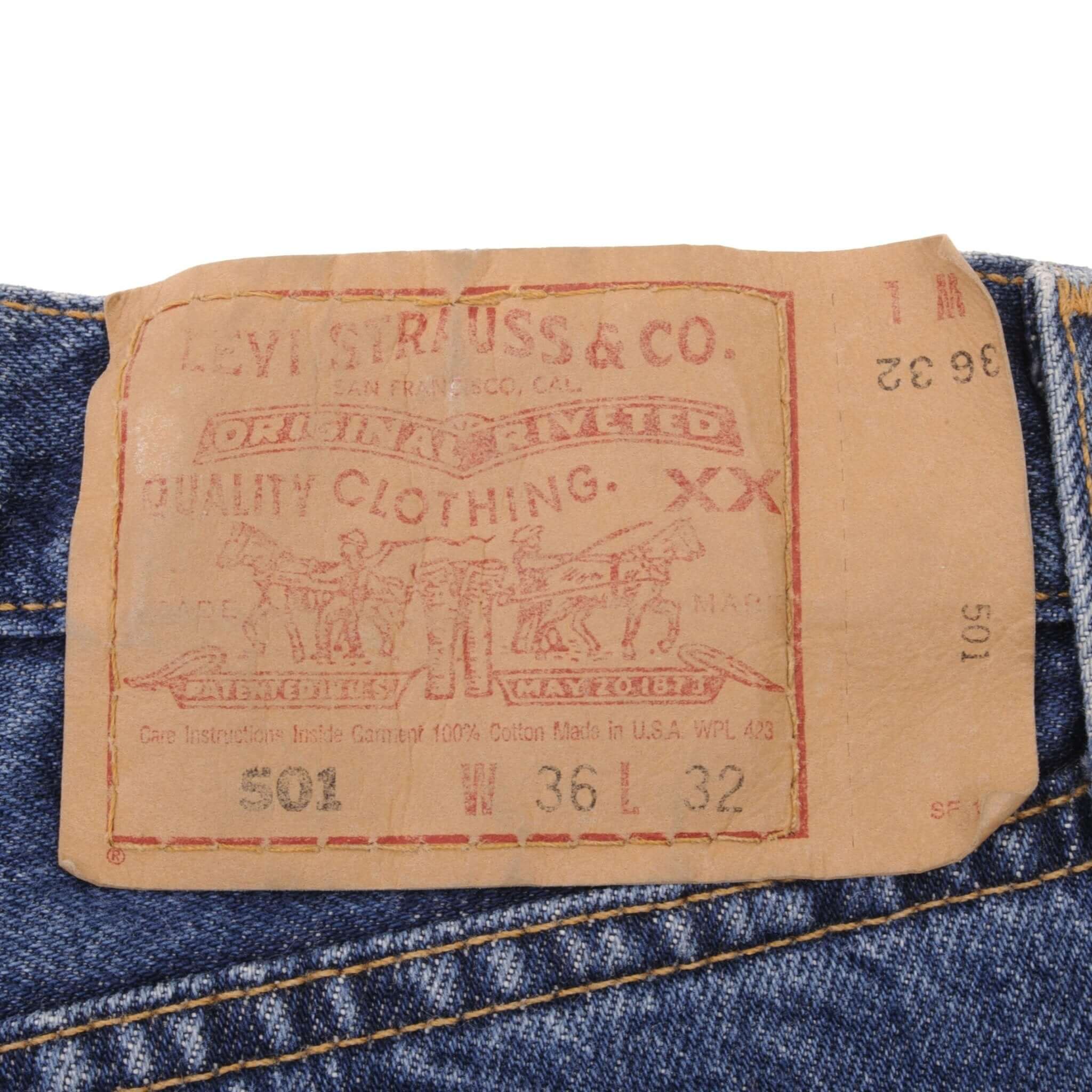 Beautiful Indigo Levis 501 jeans 1990s Made in USA with Medium Dark Wash.  Size on tag 36X32 Actual Size 35X31 Back Button #511