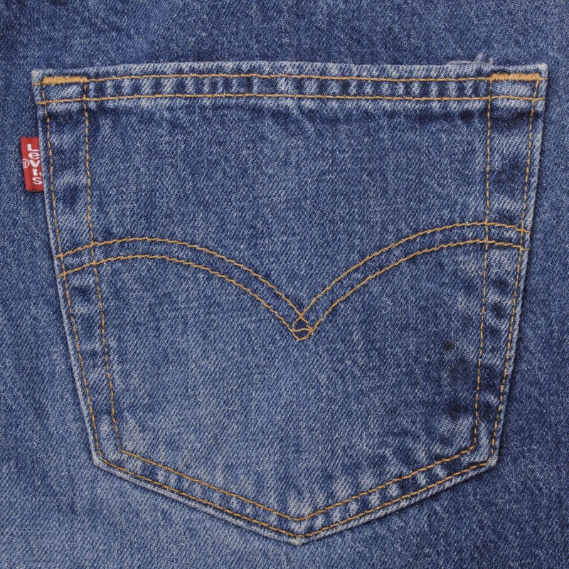 Beautiful Indigo Levis 501 jeans 1990s Made in USA with Medium Dark Wash.  Size on tag 36X32 Actual Size 35X31 Back Button #511
