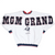 A white vintage crewneck sweatshirt featuring 'MGM GRAND' in large navy blue block letters with red trim across the chest, and a small Las Vegas lion graphic below. The sweatshirt has navy and red ribbed trim at the collar, cuffs, and hem.