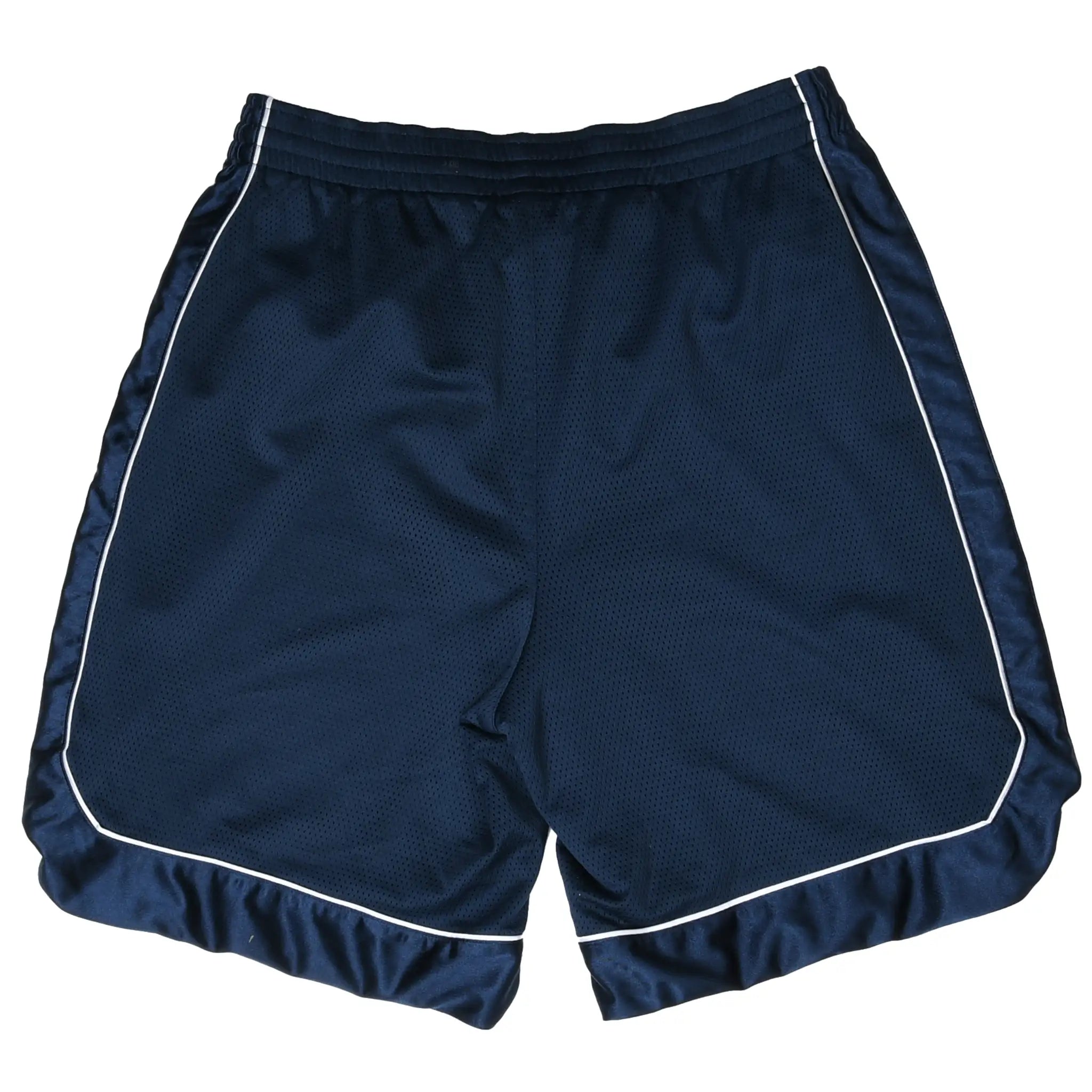 Back of navy blue Nike basketball shorts with white piping and curved hems