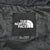 Interior The North Face neck label with men's US size small marking