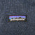 Patagonia logo patch on blue knit fleece chest
