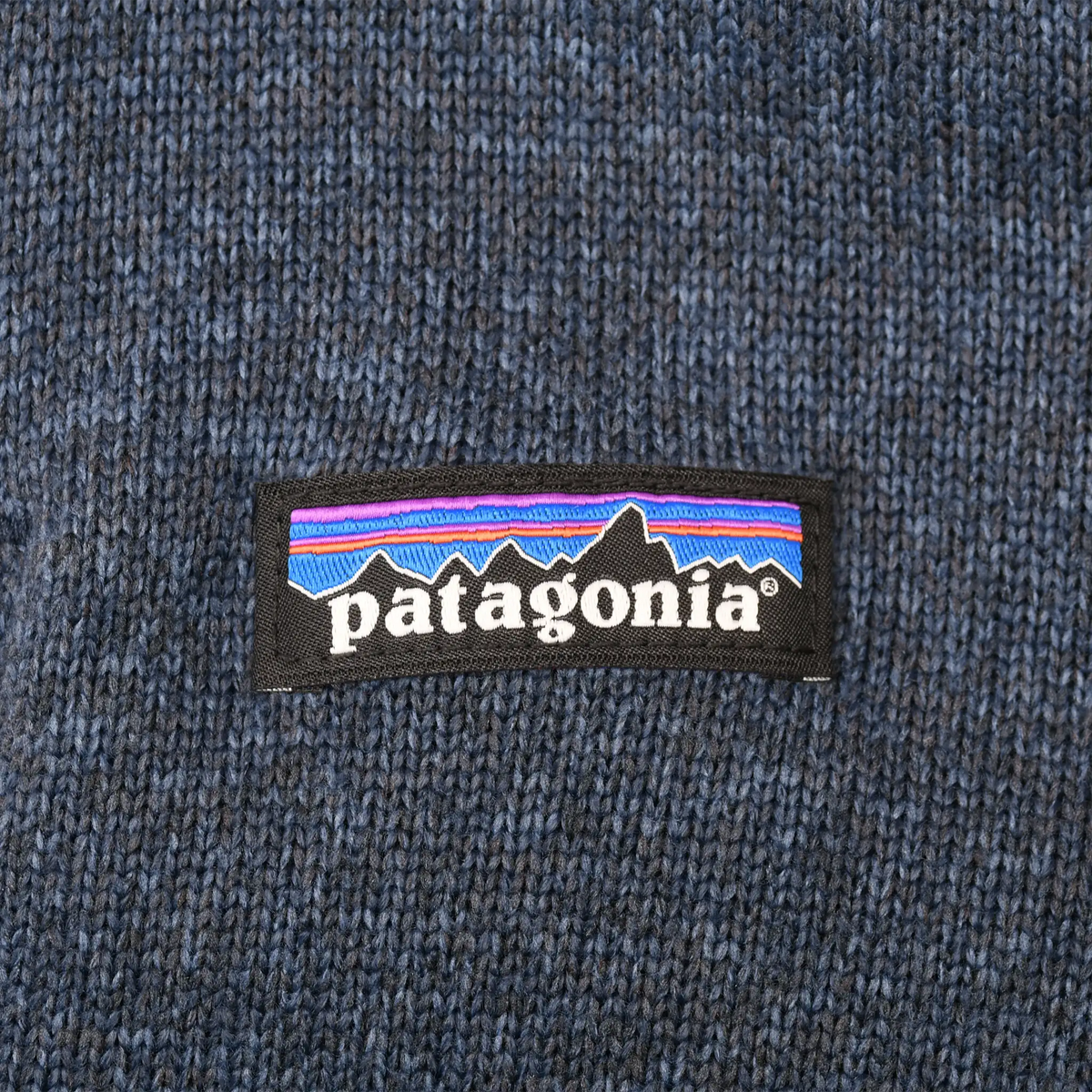Patagonia logo patch on blue knit fleece chest