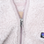 Close-up of quarter-zip closure and plush fleece texture