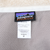 Patagonia Synchilla neck label and women's medium size tag inside jacket