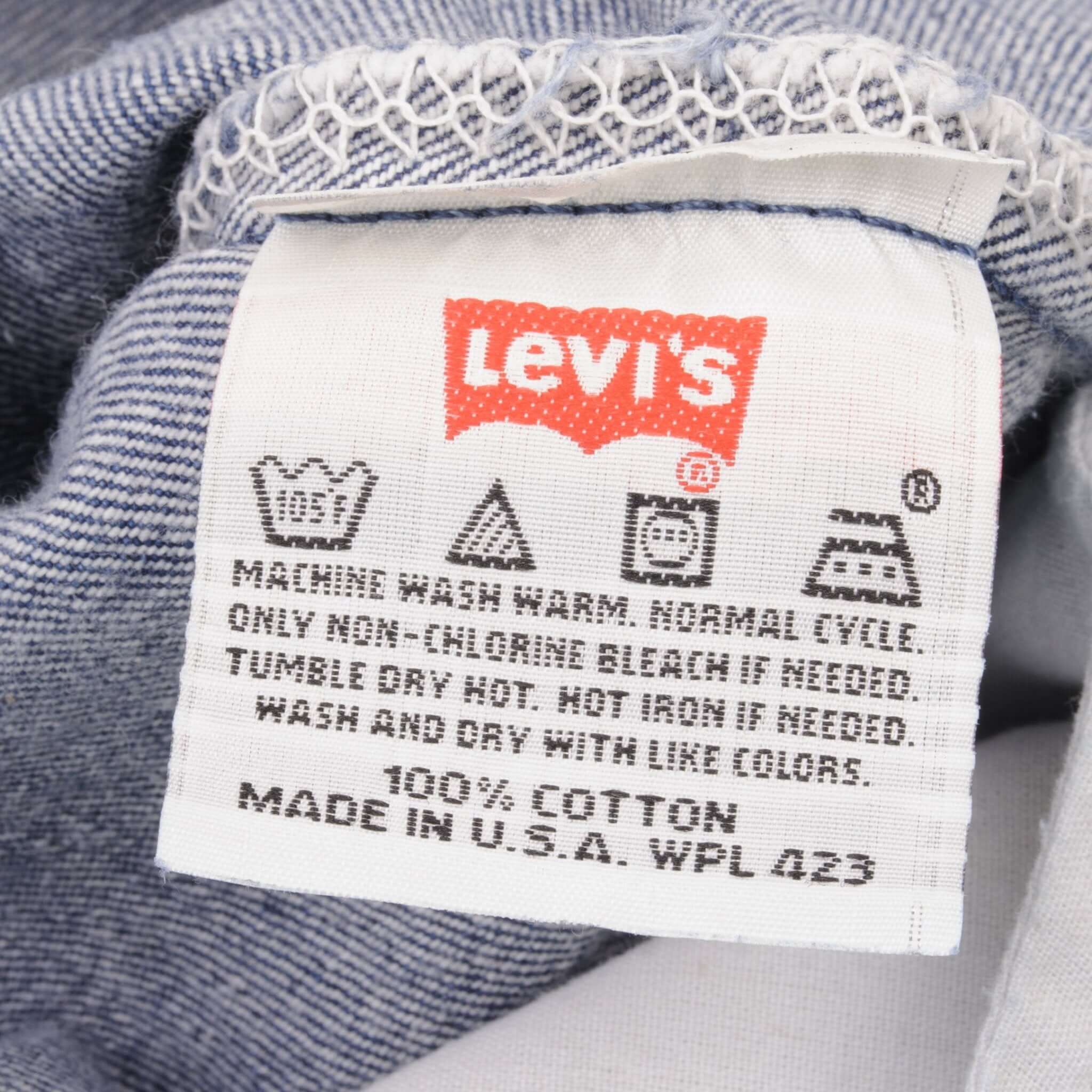 Beautiful Indigo Levis 501 Jeans 1990s Made in USA with Medium Dark Wash.  Size on tag 35X30 Actual Size 34X29  Back Button #524A