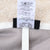 Patagonia jacket care tag with style and production details