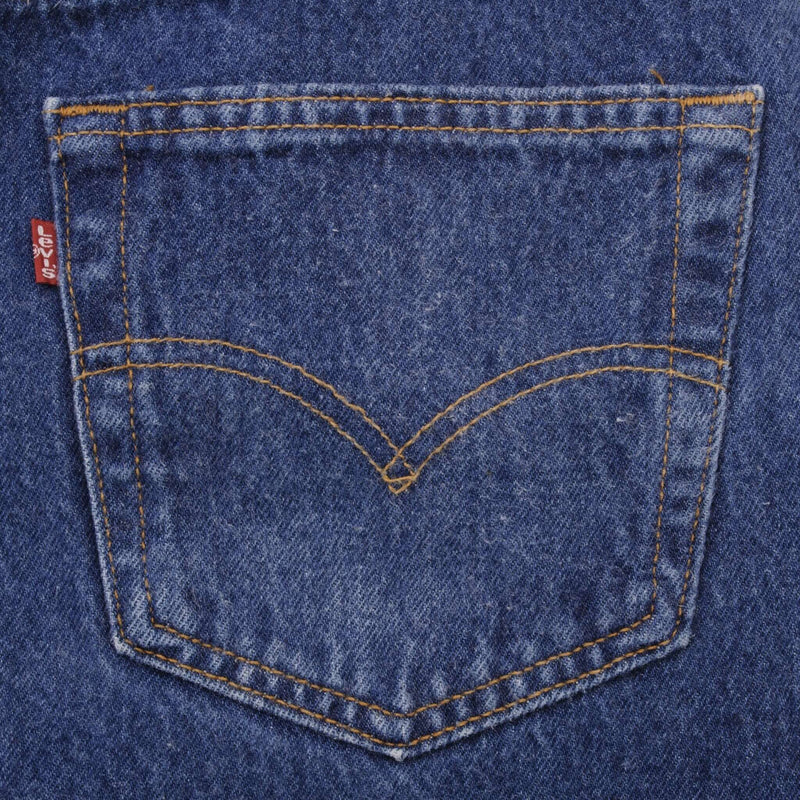 Beautiful Indigo Levis 501 Jeans 1990s Made in USA with Medium Dark Wash.  Size on tag 35X30 Actual Size 34X29  Back Button #524A