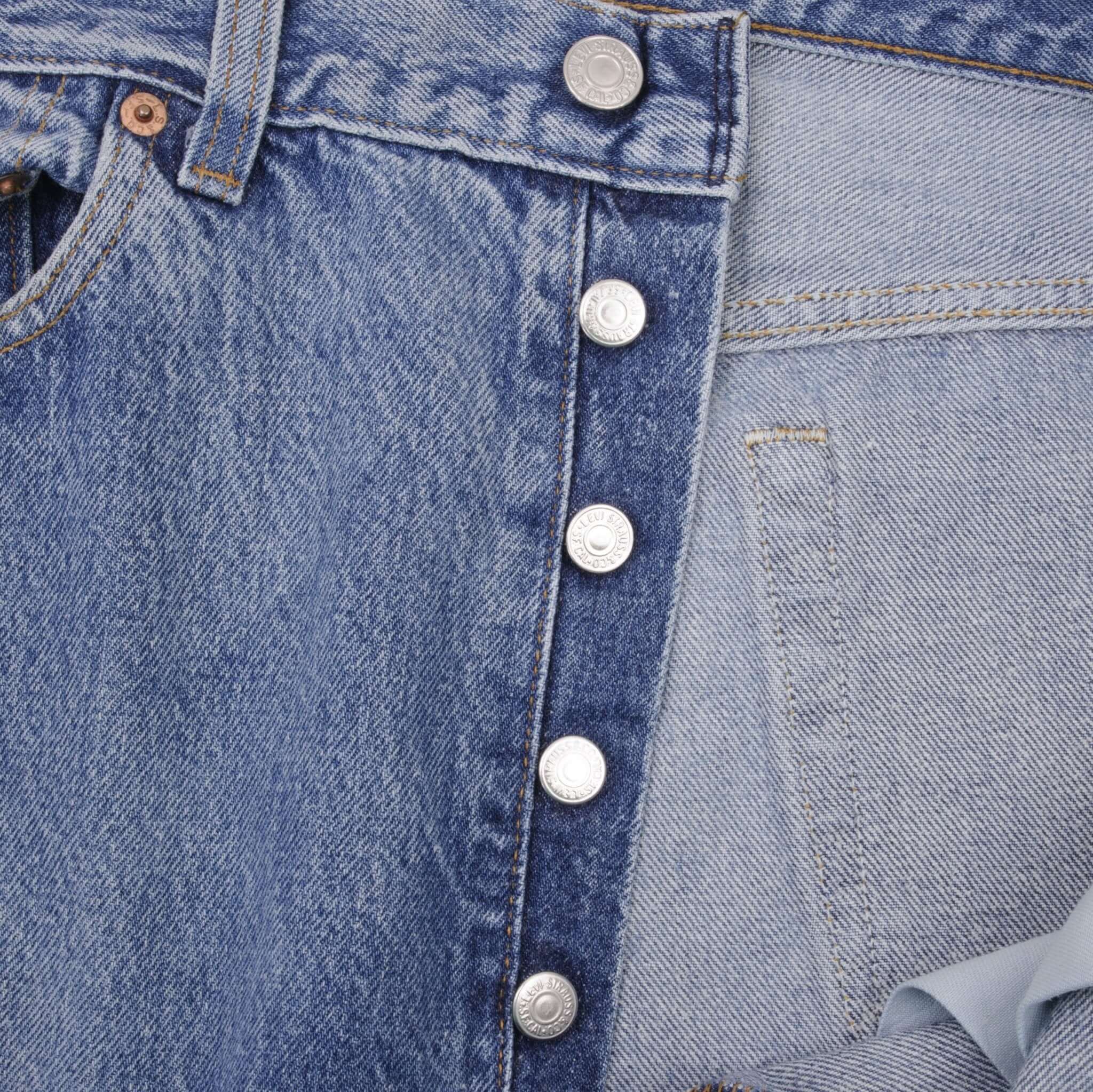 Beautiful Indigo Levis 501 Jeans 1980s Made in USA with Medium Light Wash.  Size on tag 35X32 Actual Size 34X31 Back Button #653