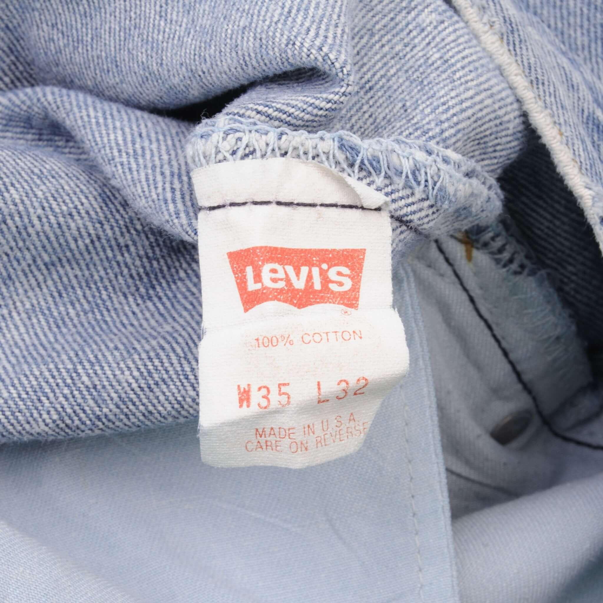 Beautiful Indigo Levis 501 Jeans 1980s Made in USA with Medium Light Wash.  Size on tag 35X32 Actual Size 34X31 Back Button #653