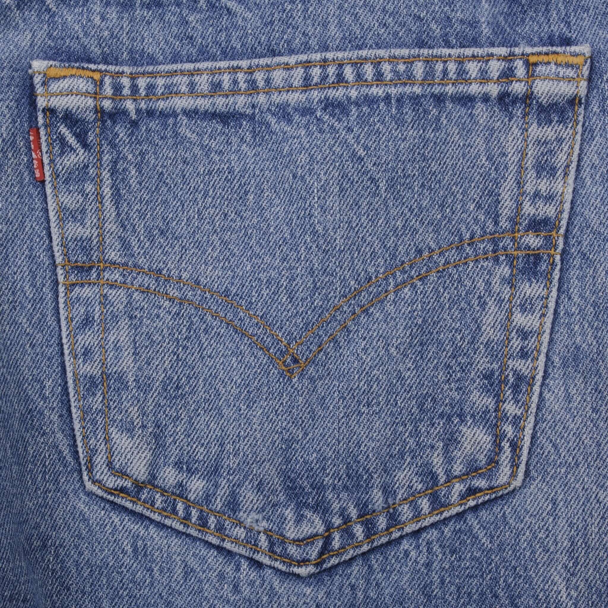 Beautiful Indigo Levis 501 Jeans 1980s Made in USA with Medium Light Wash.  Size on tag 35X32 Actual Size 34X31 Back Button #653