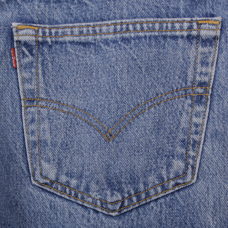 Beautiful Indigo Levis 501 Jeans 1980s Made in USA with Medium Light Wash.  Size on tag 35X32 Actual Size 34X31 Back Button #653