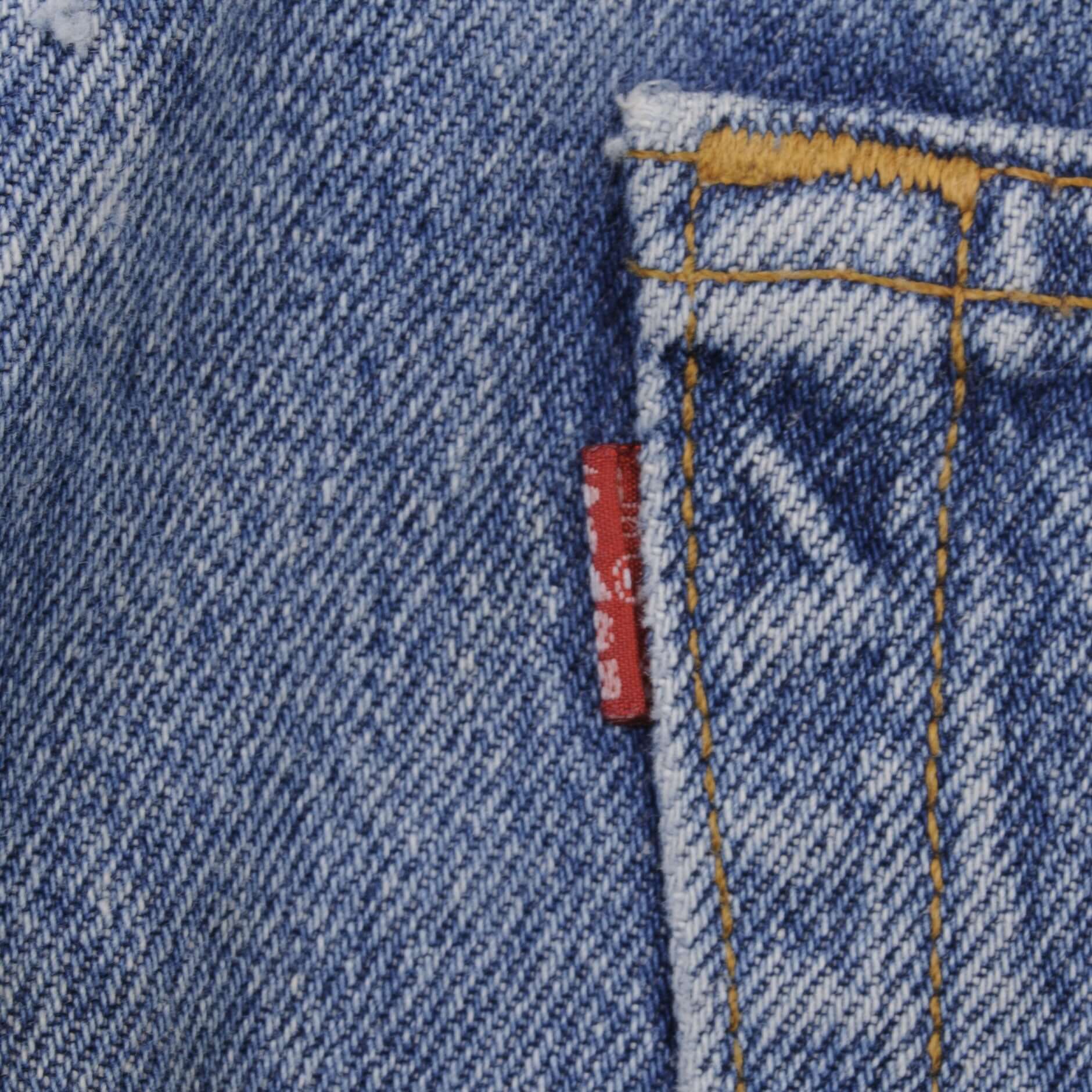 Beautiful Indigo Levis 501 Jeans 1980s Made in USA with Medium Light Wash.  Size on tag 35X32 Actual Size 34X31 Back Button #653