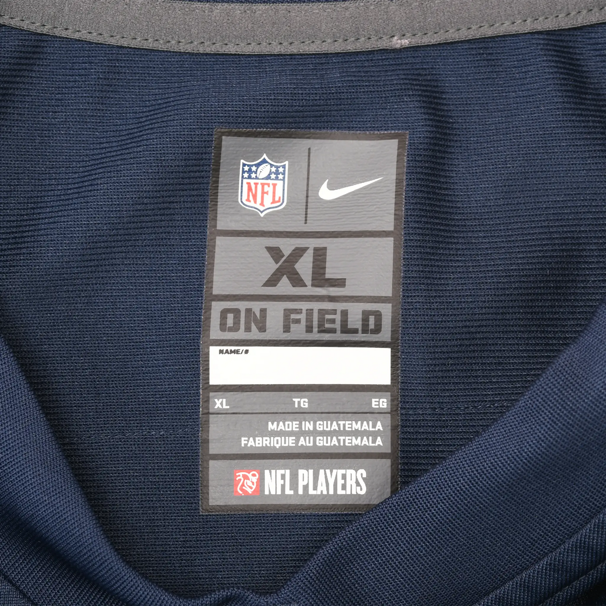 Interior Nike NFL On Field neck label marked XL
