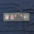Nike NFL jersey hem label marked XL on navy fabric