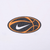 Close-up of black and orange basketball graphic with white Nike Swoosh