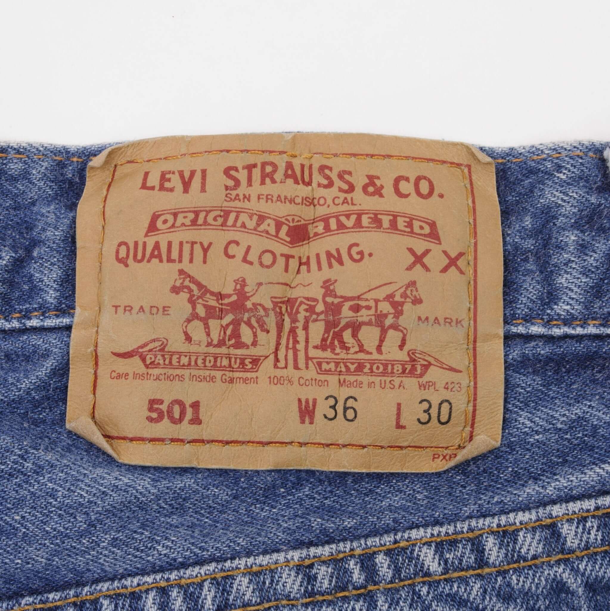 Beautiful Indigo Levis 501 Jeans 1980s Made in USA with Medium Light Wash.  Size on tag 36X30 Actual Size 35X30  Back Button #522