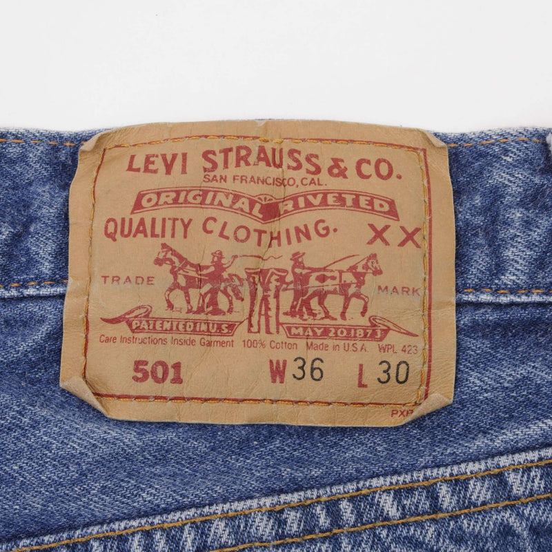 Beautiful Indigo Levis 501 Jeans 1980s Made in USA with Medium Light Wash.  Size on tag 36X30 Actual Size 35X30  Back Button #522