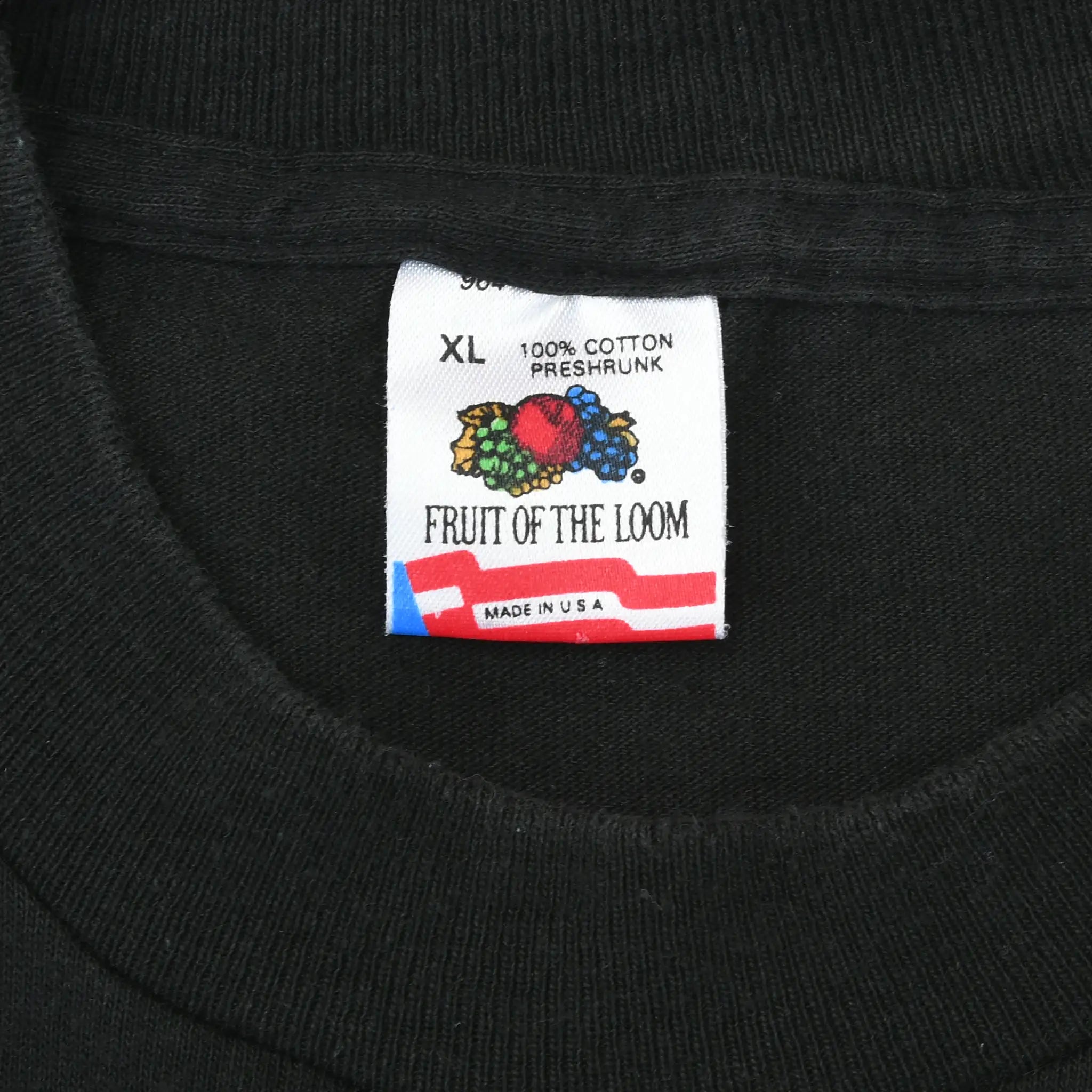 Close-up of Fruit of the Loom XL neck label on black T-shirt