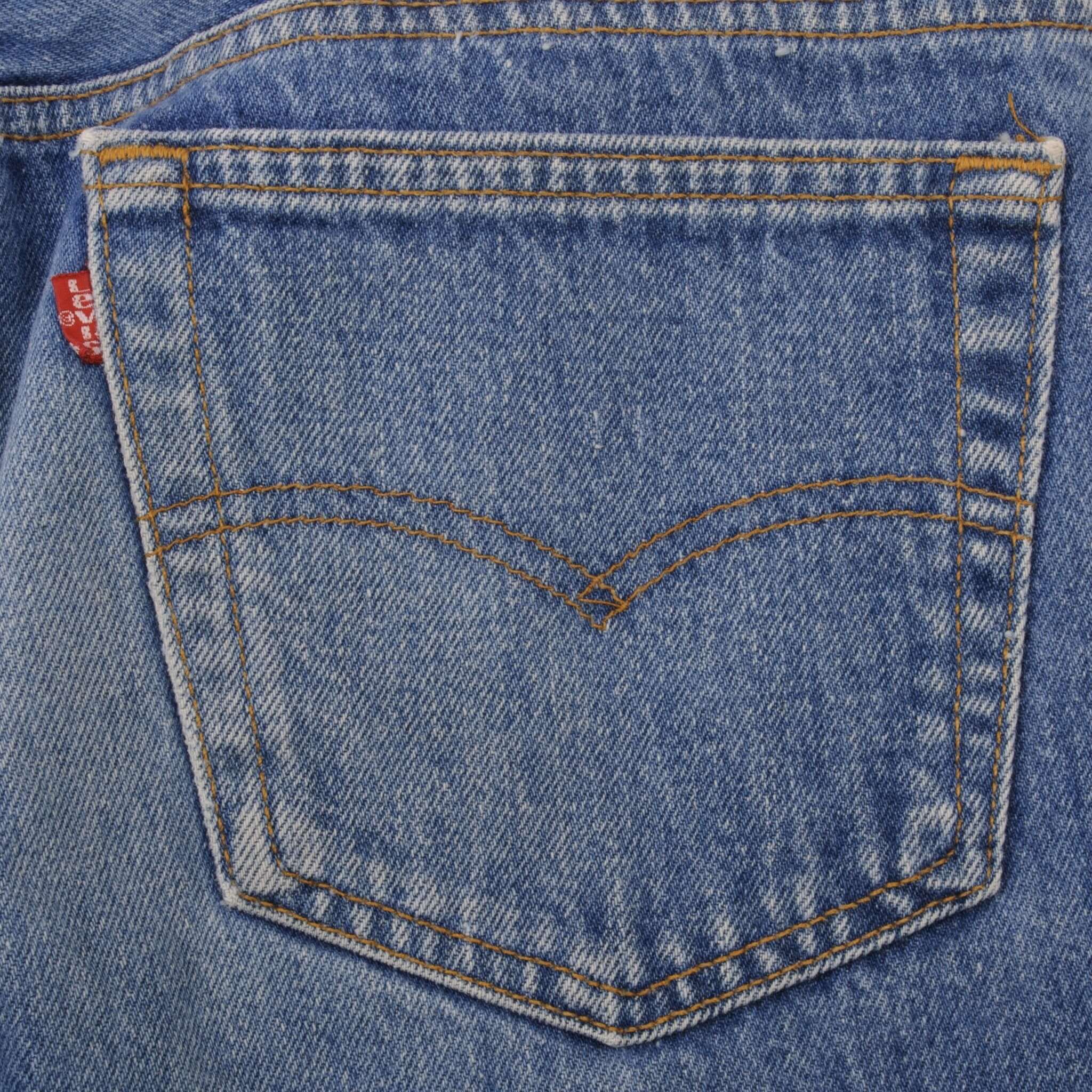 Beautiful Indigo Levis 501 Jeans 1980s Made in USA with Medium Light Wash.  Size on tag 36X38 Actual Size 36X35  Back Button #552