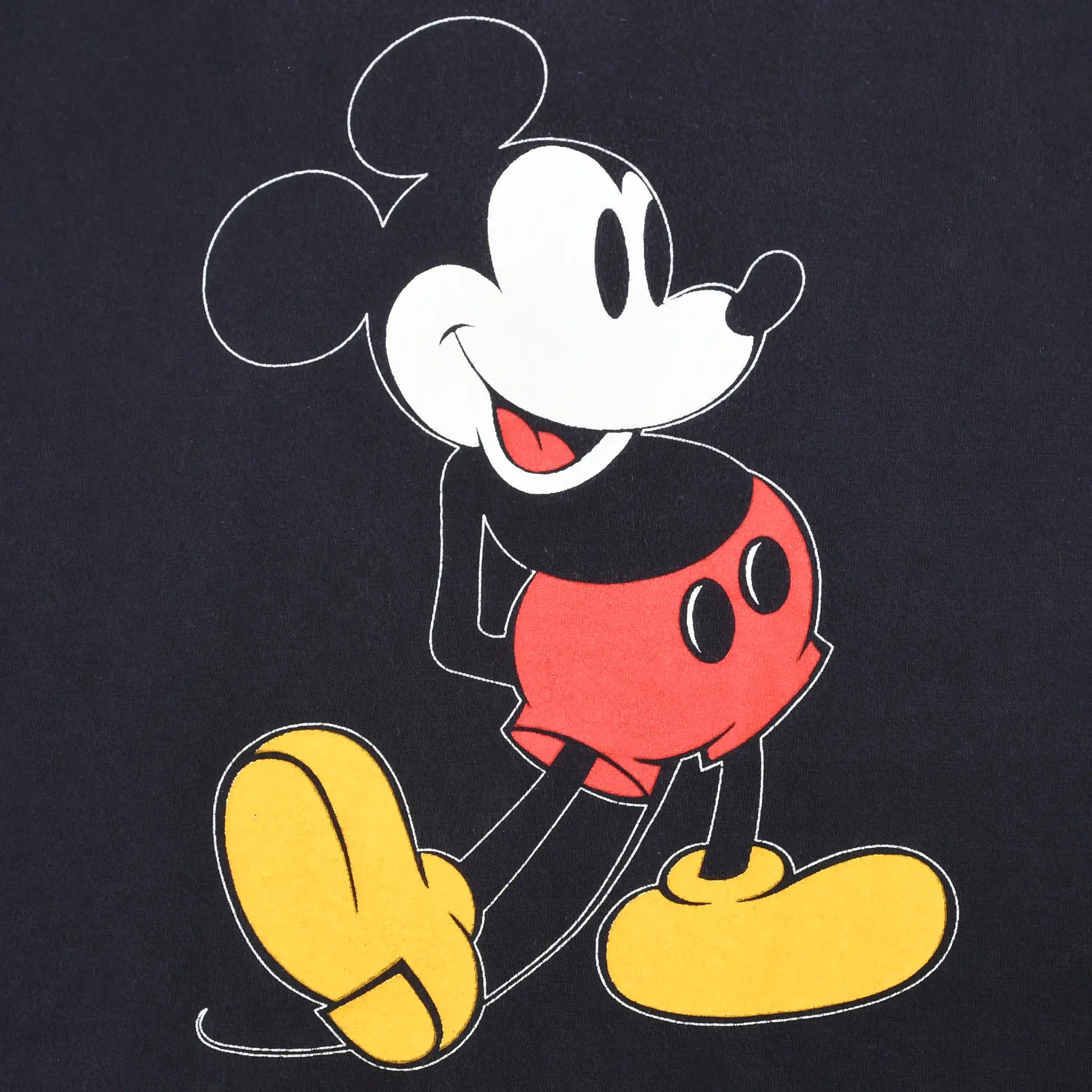 Close-up of Mickey Mouse graphic printed on black T-shirt