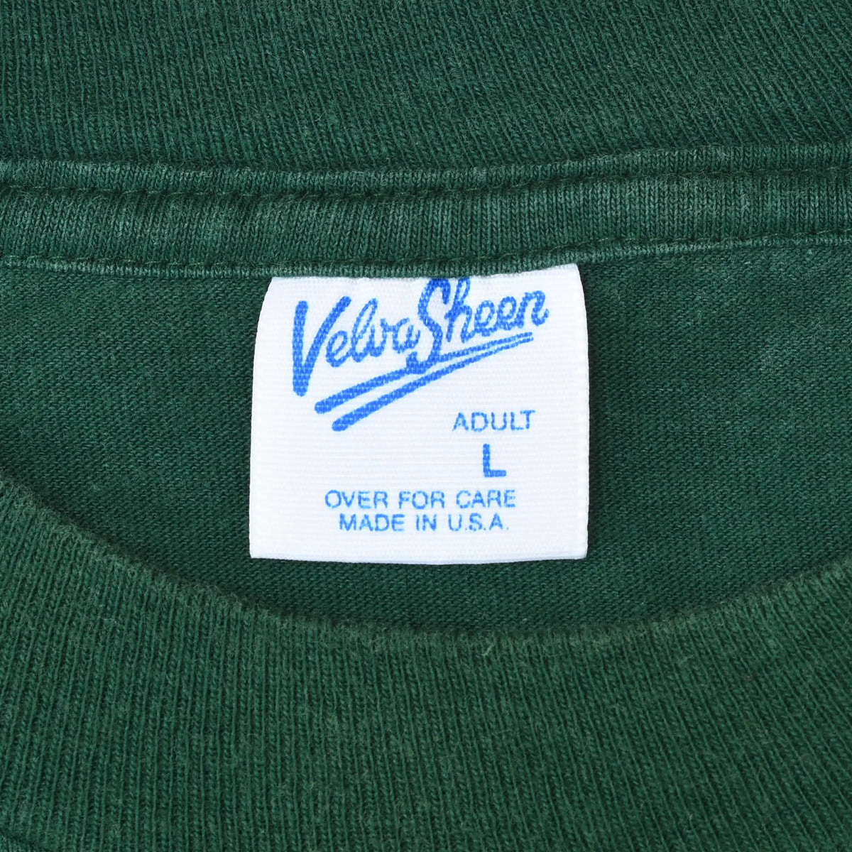 Velva Sheen Adult L Made in U.S.A. neck label on dark green T-shirt