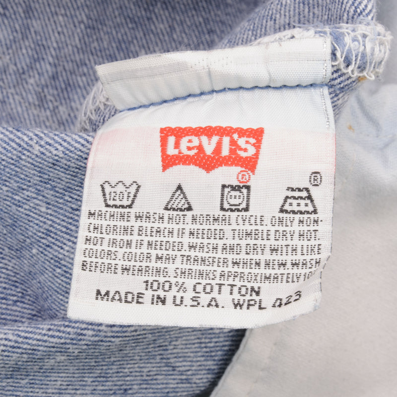 Beautiful Indigo Levis 501 Jeans 1990s Made in USA with Medium Light Wash.  Size on tag 35X34 Actual Size 35X34 Back Button #524