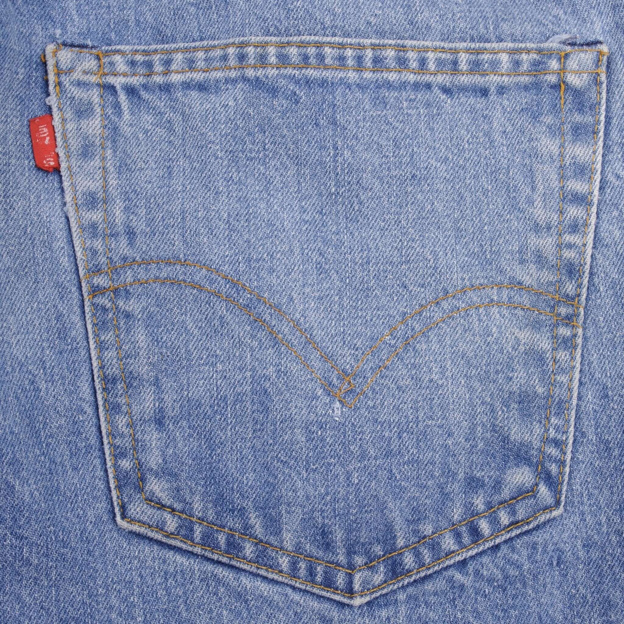Beautiful Indigo Levis 505 Jeans Made in USA with a medium blue wash and a nice contrast between medium and light blue.  Size on Tag 32X29  Back Button #650