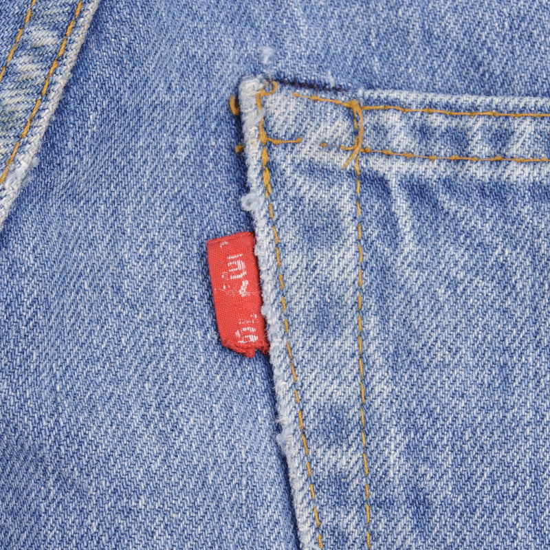 Beautiful Indigo Levis 505 Jeans Made in USA with a medium blue wash and a nice contrast between medium and light blue.  Size on Tag 32X29  Back Button #650