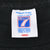 Logo 7 neck tag marked large and made in USA on black T-shirt