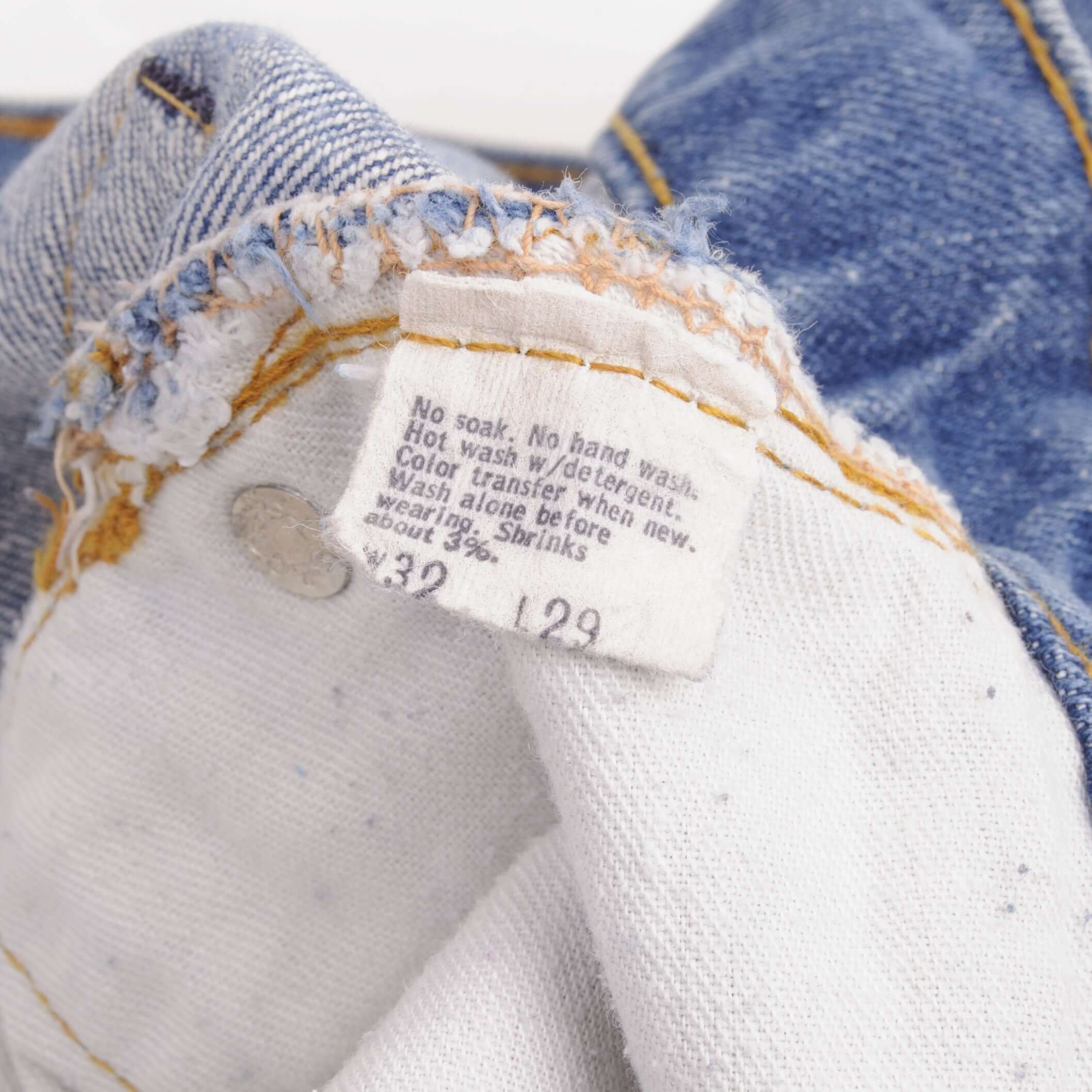 Beautiful Indigo Levis 505 Jeans Made in USA with a medium blue wash and a nice contrast between medium and light blue.  Size on Tag 32X29  Back Button #650